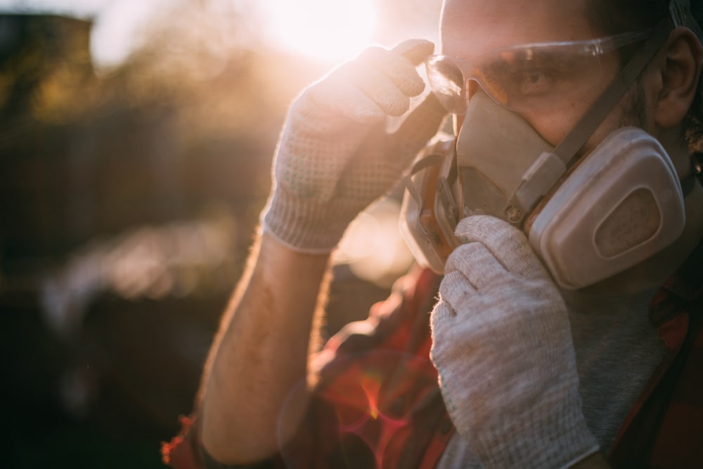 Man in goggles and respirator