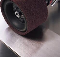 3M™ Trizact Cloth Belt 217EA, A45 JE-weight, 2-12/32 in x 157-16/32 in, Film-lok, Full-flex image 3M™ Trizact Cloth Belt 217EA, A45 JE-weight, 2-12/32 in x 157-16/32 in, Film-lok, Full-fleximage