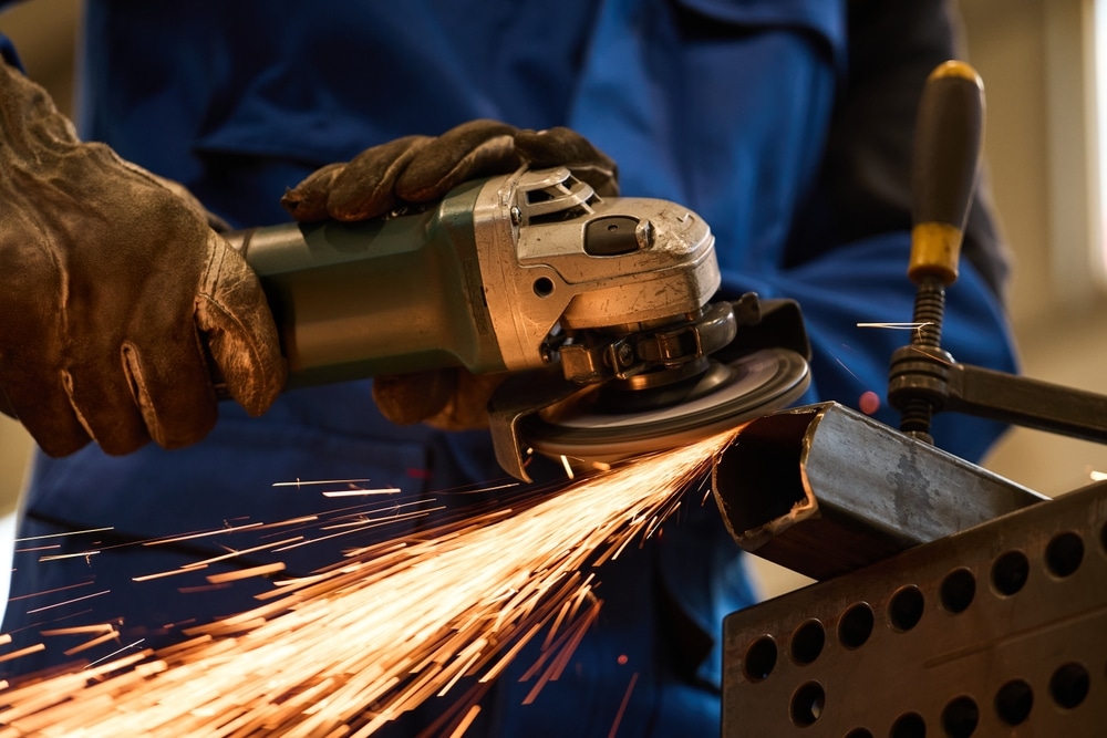 Metal grinding with a tool